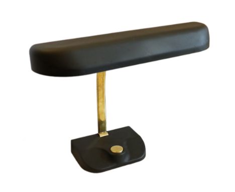 A mid century German lacquered and ebonised brass desk lamp with loaded base incorporating a button switch, width 50cm, heigh