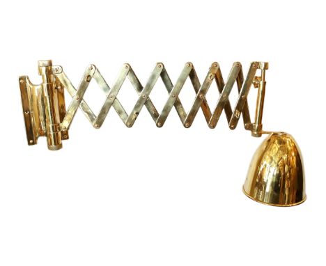 An early 20th century style brass expandable wall light with down-lighter shade, depth 34cm expanding to 79cm, height 36cm
&n