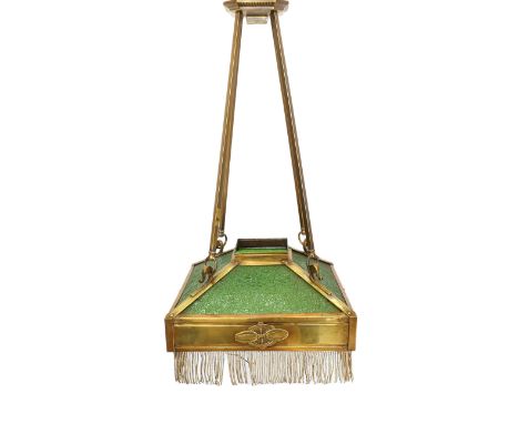 An early 20th century French lacquered brass and green glass light fitting of squared form, with silvered wire tasselled frin