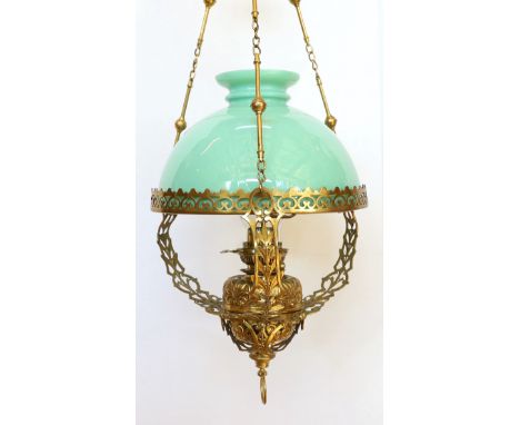 A Victorian cast brass hanging oil lamp with opaque green glass shade, width 42cm, height 94cm
***CONDITION REPORT***Good ori