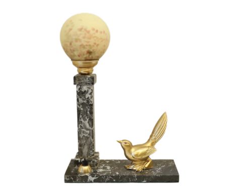 A 1930's French gilt spelter and marble desk lamp modelled as a bird perched beside a column with pate de verre globular shad
