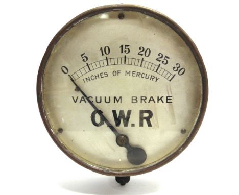 A GREAT WESTERN RAILWAY BRASS VACUUM BRAKE PRESSURE GAUGE  the circular dial calibrated to 30 inches of mercury, the face of 