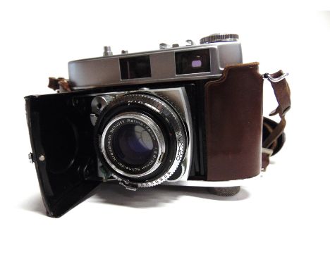 A KODAK RETINA IIC TYPE 029 RANGEFINDER CAMERA  with a scarce Retina Stereo Xenon 50mm Heligon 50mm lens, the whole in a trav
