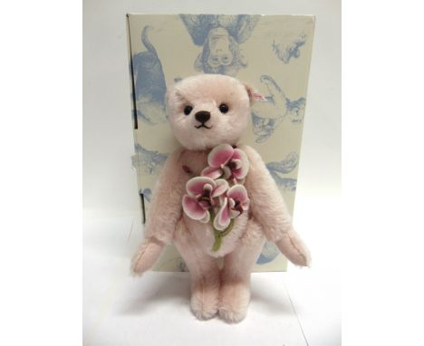 A STEIFF COLLECTOR'S TEDDY BEAR 'LAELIA'  rose, limited edition 1049/1500, with certificate of authenticity, 31cm high, boxed