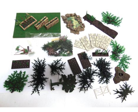 A BRITAINS PLASTIC FLORAL GARDEN COLLECTION  comprising flowers, flower beds, walls, fencing, trees, a pond, a greenhouse, la