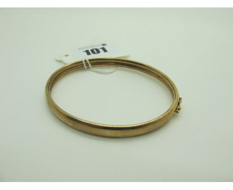 A 9ct Gold Plain Oval Bangle, (6.3grams). 