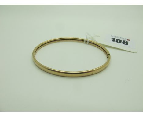 A 9ct Gold Plain Oval Bangle, (5grams). 