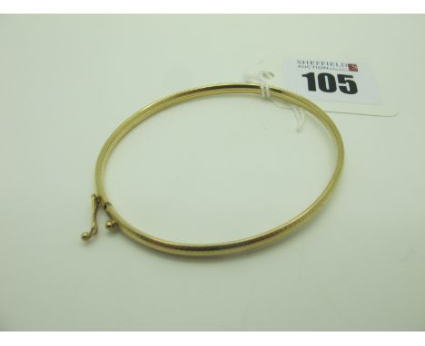A 9ct Gold Plain Oval Bangle, (3.5grams). 