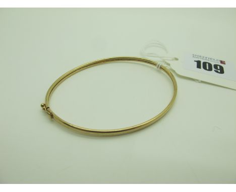 A 9ct Gold Plain Oval Bangle, (2grams). 