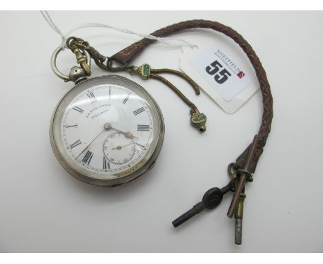 H.E. Peck London Swiss Made; An Openface Pocketwatch, the signed white dial with black Roman numerals and seconds subsidiary 