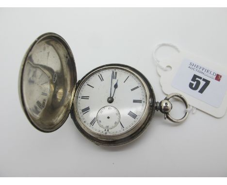 A Hallmarked Silver Cased Hunter Pocketwatch, the white dial with black Roman numerals (lacking hands / glass), within engine