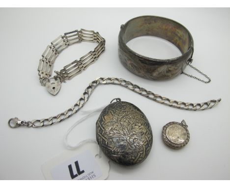 A Wide Hallmarked Silver Bangle, (dents) a large oval locket pendant, foliate engraved, a gate link style bracelet, a circula