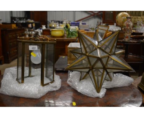 Two brass and glass light fittings, one in the form of a star
