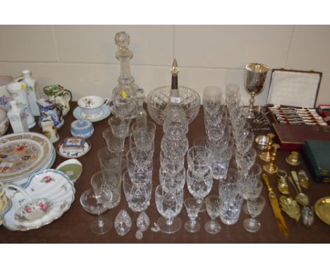 A quantity of various drinking glasses, decanter; a silver collared bottled and stopper etc.