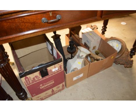 An oak barometer and three boxes containing clocks, table lamp bases; an oriental vase; collector's plates etc. 