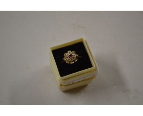 A 9ct gold white stone and ruby set ring 