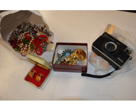 A bag of various costume jewellery; a pocket watch; a Kodak camera; and a box of various costume brooches 