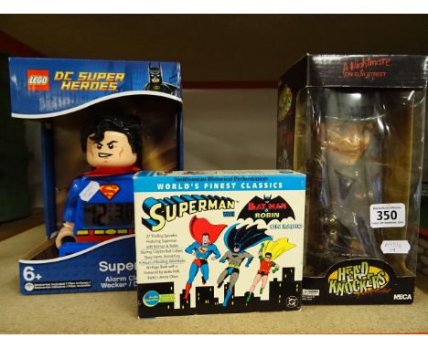 Lego DC Superman alarm clock (boxed) plus boxed Superman with Batman & Robin on radio cassettes and boxed Neca Nightmare on E