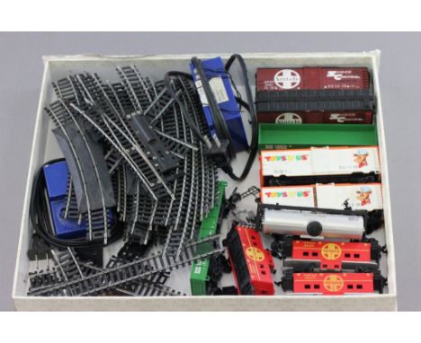 Ten Life Like HO scale wagons including Toys R Us x 2 plus quantity of track 