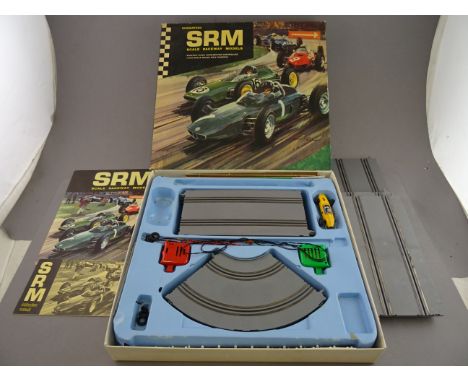 Boxed SRM Scale Raceway Models with one car missing, car present is yellow BRM, with instructions, box vg