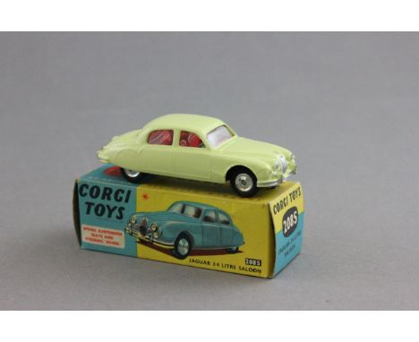 Boxed Corgi 208S Jaguar 2.4 Litre Saloon in lemon yellow with red interior, diecast excellent, box gd