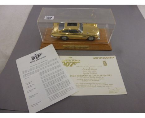 Danbury Mint Ltd Edition James Bond 007 1:24 scale 22 carat gold plated Aston Martin DB5, Serial No. 0519 with certificate of