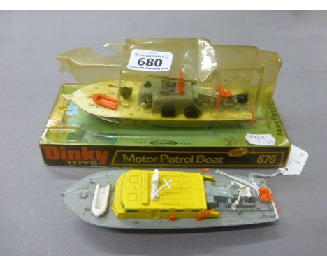 Boxed Dinky 675 Motor Patrol Boat (unopened but damaged plastic lid) plus another unboxed