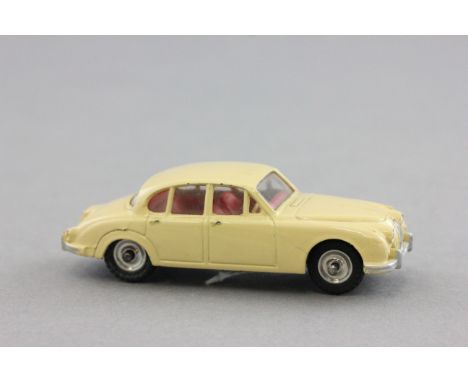 Dinky Jaguar 3.4 Litre in cream with red interior.  Some minor paint chips, overall good