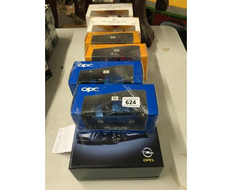 Twelve boxed diecast Opel 1:43 scale cars to include; Minichamps, GTC Concept & Motorsport vehicles in unused condition 