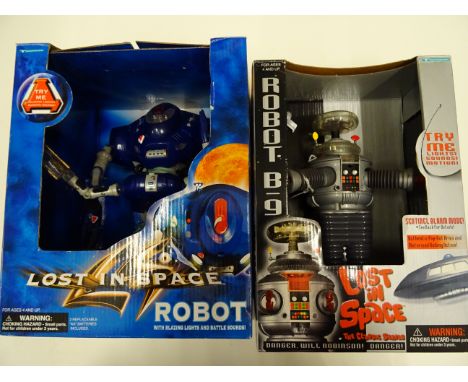 Two boxed Trendmasters Lost In Space robots to include B9 and Robot both vg