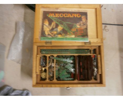 Wooden box containing trays of vintage Meccano