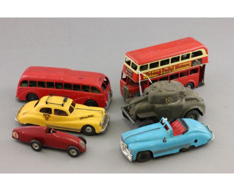 Group of six tin plate, clockwork, plastic vintage vehicles to include Triang Minic and Mettoy featuring Triang Bus, Triang T