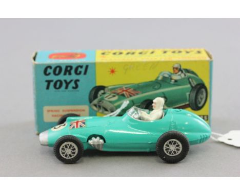 Boxed Corgi 1525 BRM Formula I Grand Prix Racing Car in turquoise green with driver with Union flag and number 3 decals in ex