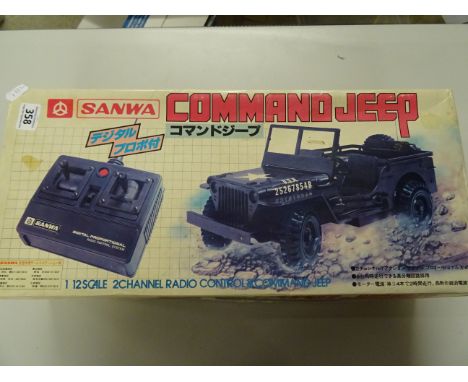 Boxed Sanwa remote control Command Jeep 1:24 scale complete with control