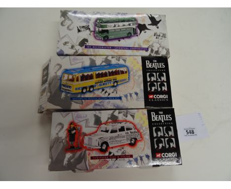 Three boxed Corgi The Beatles Collection diecast vehicles to include Newspaper Taxi, Magical Mystery Tout Bus and AEC Routema