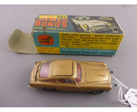 Corgi 261 James Bond Austin Martin DB5 in good condition with one ejector figure with box, no inner display stand, box missin