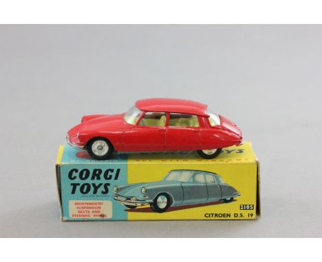 Boxed Corgi 210S Citroen DS 19 in red, diecast excellent with minor paint chips with fair-gd box