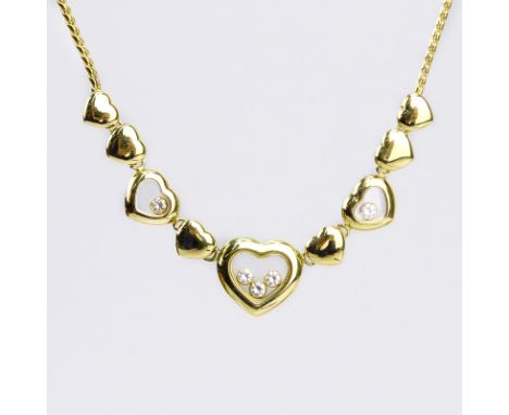 Vintage Chopard Happy Diamond and 18 Karat Yellow Gold Multi Hearts Charm Necklace. Diamonds F color, VS1 clarity. Signed, 75