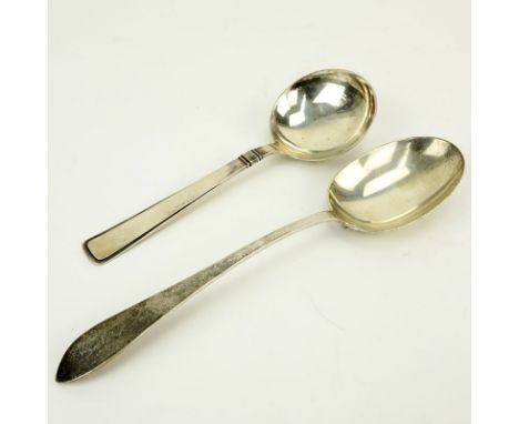 Grouping of Two (2) Sterling Silver Serving Spoons. Includes: Tiffany & Co. "Faneuil" vegetable serving spoon (9-5/8" L, mono