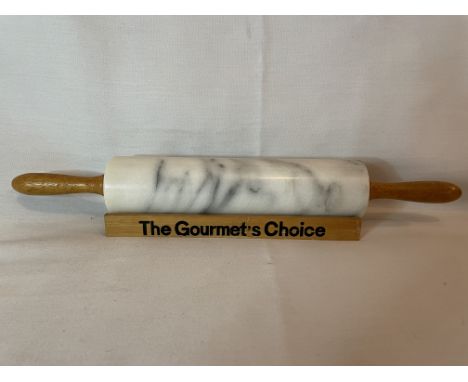 KITCHENALIA - VINTAGE POLISHED MARBLE ROLLING PIN
A vintage “The Gourmets Choice” polished marble Rolling Pin with wooden sta