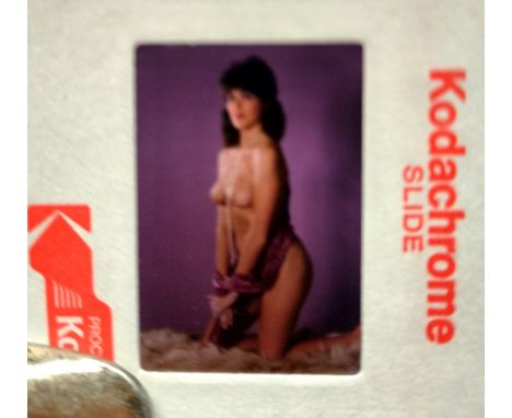 ADULT GLAMOUR - 35MM SLIDES X 34
aken by a professional photographer based in London.
Models unknown.
Please note: The photog