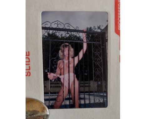 GLAMOUR - 35MM SLIDES MODELS X 31
Taken by a professional photographer based in London.
Models unknown.
Please note: The phot