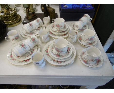 A FORTY ONE PIECE ROYAL STANDARD RAMBLING ROSE TEA SERVICE
