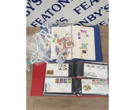 2 FIRST DAY COVER ALBUMS TOGETHER WITH A STAMP ALBUM CONTAINING MISCELLANEOUS STAMPS