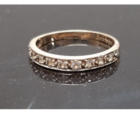 A 9CT YELLOW GOLD AND DIAMOND HALF ETERNITY RING CONTAINING 9 DIAMONDS STAMPED 375 SIZE Q 1/2 2G GROSS