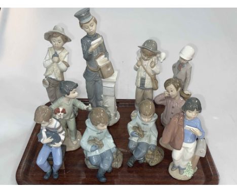 Collection of Nao figurines of Boys including Boys with Dogs, Rabbits, Teddy and Bird.