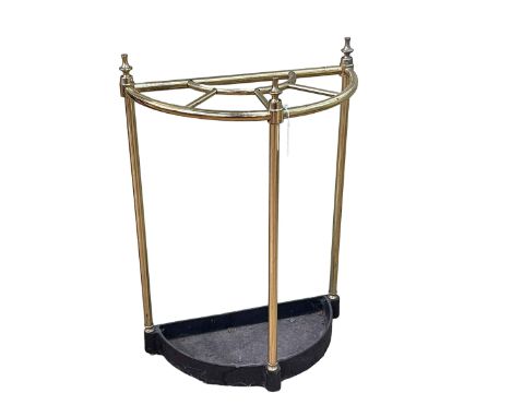 Brass and iron bow front five division stick stand, 60cm by 40.5cm by 20cm.