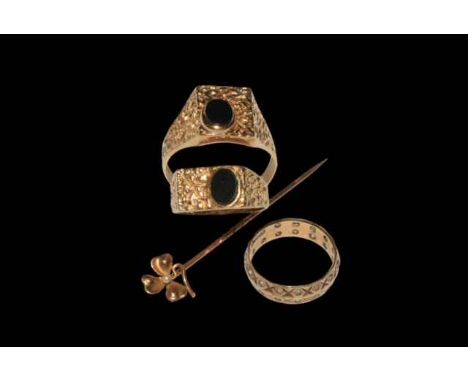 Two gents 9 carat gold rings, gold band ring and clover leaf stick pin (4).