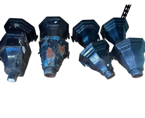 Eight cast hopper heads.