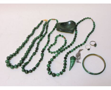 Three single row graduating malachite bead necklaces, a single row circular malachite bead bracelet with glass bead inset, a 